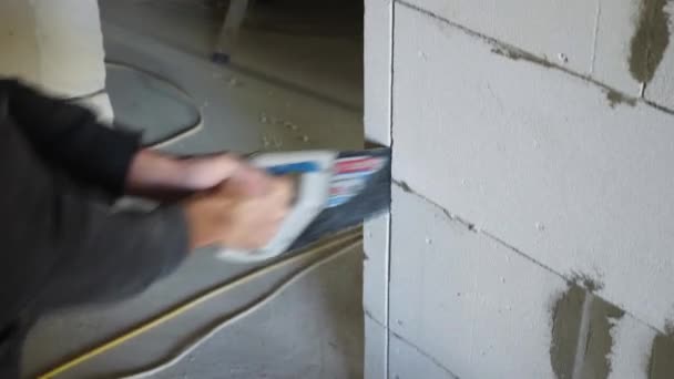 Man Hands Sawing Foam Block Hand Saw Concept Room Renovation — Stock Video