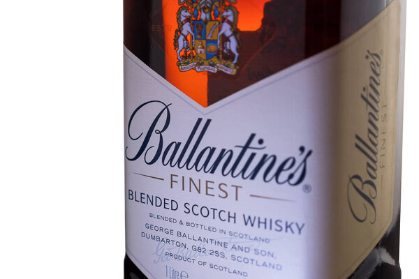 Close-up of a bottle of Ballantine's Whiskey against a white background. A world famous brand from Scotland. Russia, Krasnodar, December 15, 2021