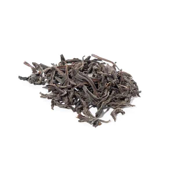 Large Dried Black Tea Leaves Piled White Background — Stockfoto