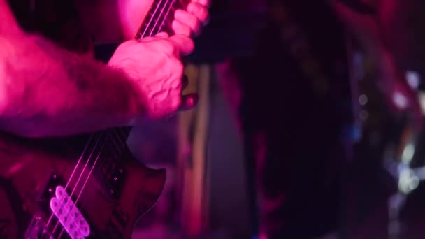 Close Neck Electric Guitar Hands Guitarist Playing Solo Purple Light — стоковое видео