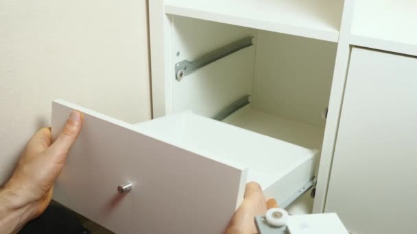 Close Man Hands Inserting White Pull Out Shelves New Cabinet — Stock Video
