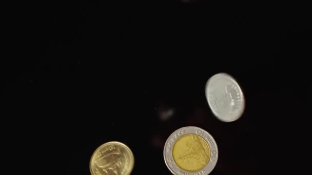 European Asian Coins Fall Black Mirror Background Slow Motion Close — Stock Video