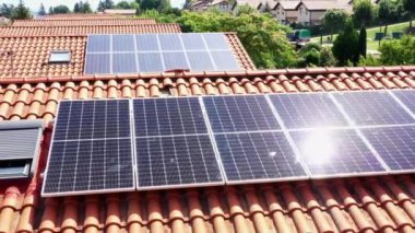 Solar panels on a roof. Drone view. 4K. Navarre, Spain, Europe. Environment and technology concepts.