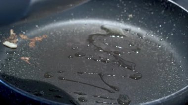 making buckwheat pancakes in the pan. close-up. 4K.