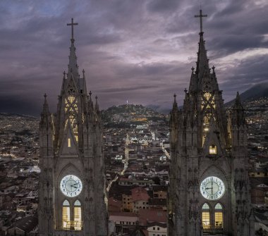 A cloudy sunset in the city of Quito, with a view from the Basilica of the national vow of the Virgin of Legarda.