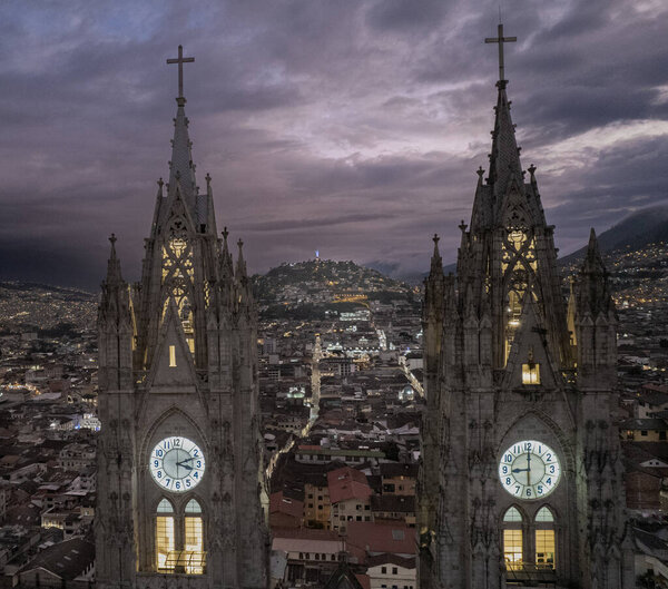 A cloudy sunset in the city of Quito, with a view from the Basilica of the national vow of the Virgin of Legarda.