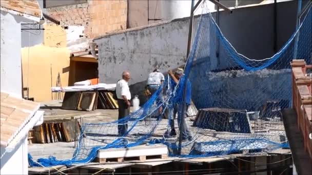 Alora Spain July 2019 Two Workers Struggling Erecting Blue Safety — Stock video