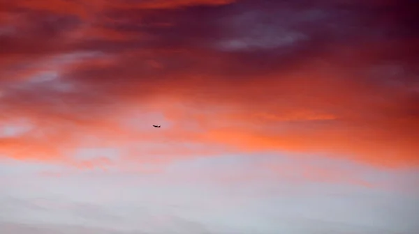 Distant Small Airplane Seen Red Morning Clouds Andalusian Village — Stock Photo, Image