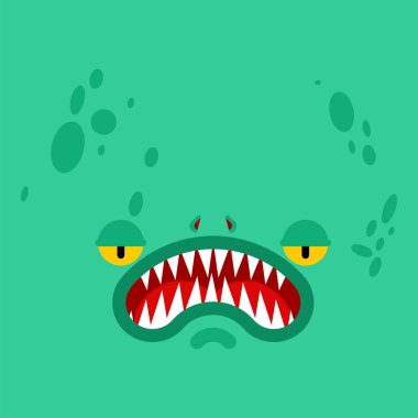 Canavar suratlı. Yeşil canavarın dişleri ve çeneleri