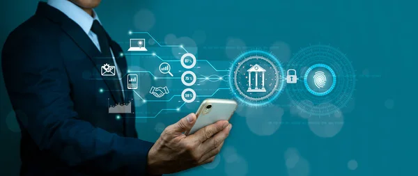 Bir işadamı kişisel mali bilgilere ulaşmak için parmak izi tanımlamasını kullanır. E-kyc (müşterinizi elektronik olarak tanıma) konsepti, biyometrik güvenlik, dijital siber suç yenilik teknolojisi