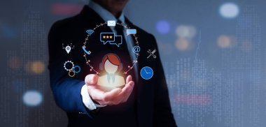 The right hand of a guy in a suit contains icons of a contact center sign and a telephone wifi massage; the theme is global satisfaction in products and services.