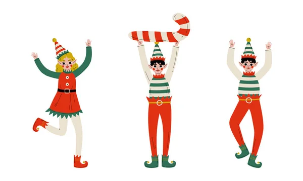 Elfe de Noël avec des oreilles pointues et chapeau comme Santa Helper Cheering et tenant Candy Cane Vector Set — Image vectorielle