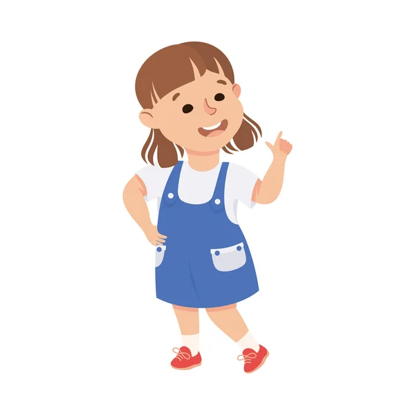 Funny Girl in Pinafore Skirt Pointing at Something with Extending Hand and Index Finger Vector Illustration — Stock Vector