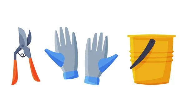 Taille, paire de gants et seau comme ensemble vectoriel d'outils de jardin — Image vectorielle