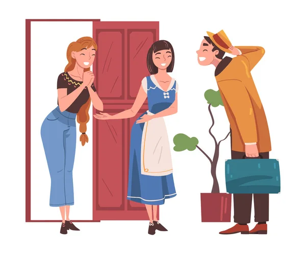 Happy Man Character Coming Back and Returning Home Standing Near Open Door with Relatives Welcoming Him Vector Illustration — Stock Vector
