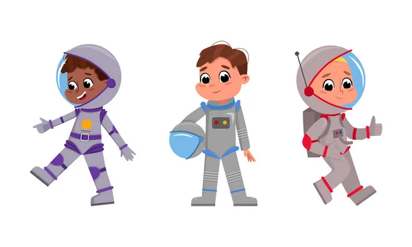 Set of cute children astronauts in space suits cartoon vector illustration on white background — Stock Vector
