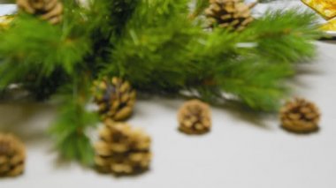 Creation of a desktop New Years composition. Composition from branches of a Christmas tree. New Year