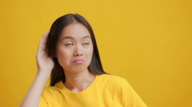 Karşıt Tarafları Dinleyen Asyalı Kadın Bilgileri Onaylıyor ve Onaylamıyor, Stüdyo