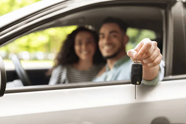 Automatic key from car in middle-eastern driver hand