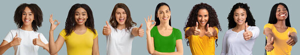 Cheerful happy diverse women gesturing, show thumbs up and ok sign, isolated on gray background