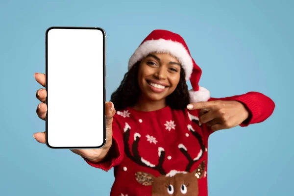 Happy black lady Santa pointing at cellphone, mockup — Stock Photo, Image