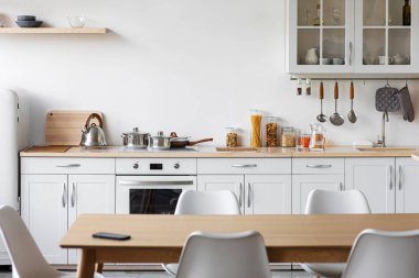Modern kitchen interior in Scandinavian style, minimalist and contemporary design clipart