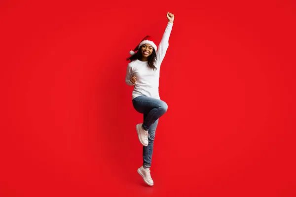 Cheerful african american young woman celebrating success — Stock Photo, Image