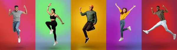 Carefree young diverse people jumping together, wearing casual outfits on colorful neon studio backgrounds, banner — Fotografia de Stock