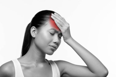 Sick asian woman having coronavirus, touching her forehead