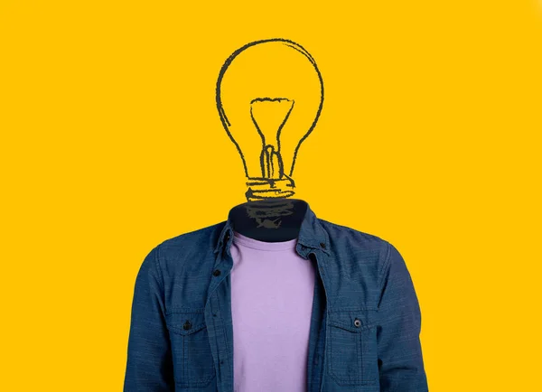 Collage with unrecognizable man wigth drawing of light bulb in place of head on orange background. Creativity concept — Stok fotoğraf