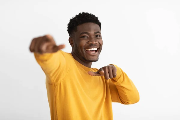 Funny african american guy gesturing on white background — Stok fotoğraf