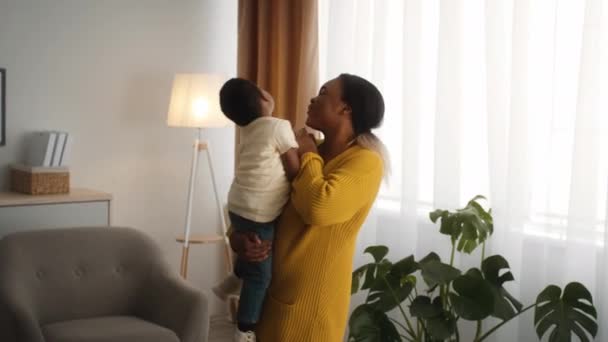 Family Time. Happy African American Mother Bonding With Little Son At Home — Stock video