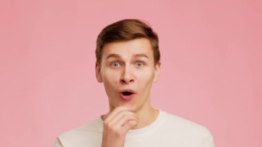 Man Thinking Having Idea Pointing Finger Up Posing, Pink Background