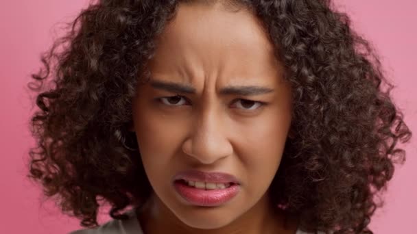 Portrait Of Offended African American Female Expressing Anger, Pink Background — Vídeo de Stock