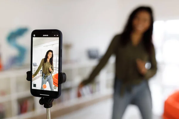 Cheerful black woman filming video on cellphone —  Fotos de Stock