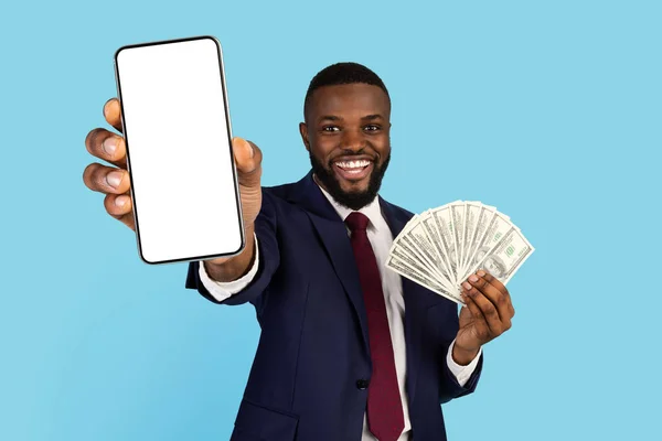 Online Profit. Excited Black Businessman Holding Blank Smartphone And Dollar Cash — 图库照片