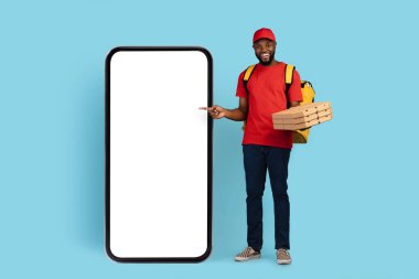 Mobile App. Black Delivery Guy Holding Pizza Boxes Pointing At Blank Phone