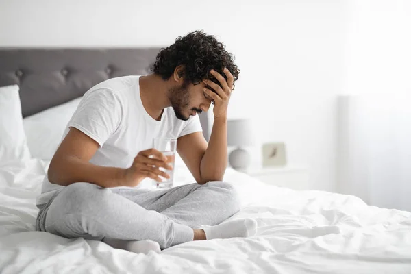 Sick hindu guy feeling bad in the morning — Stock Photo, Image