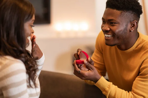 African Man Proposing Showing Engagement Ring Box To Girlfriend Indoor — Stockfoto