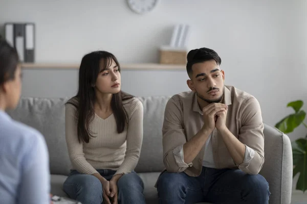 Marital psychotherapy. Sad arab spouses with relationship problems sitting at therapy session with psychologist — Stock Photo, Image