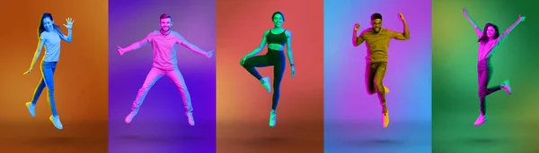 Collage of jumping and posing in air carefree diverse young people on color neon studio backgrounds, panorama — ストック写真