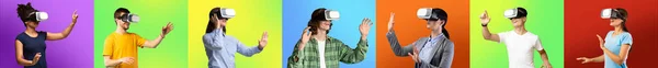 Shocked smiling millennial international men and women in virtual reality glasses touch air — Stok fotoğraf