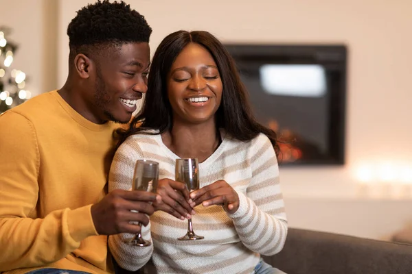 Joyful African American Spouses Holding Glasses Laughing Celebrating Valentines Indoors — стокове фото