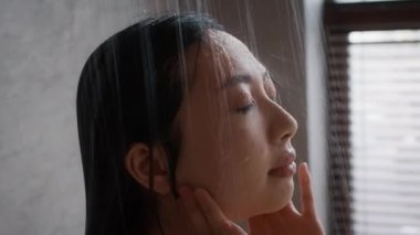 Wellness Concept. Closeup Shot Of Young Asian Female In Shower