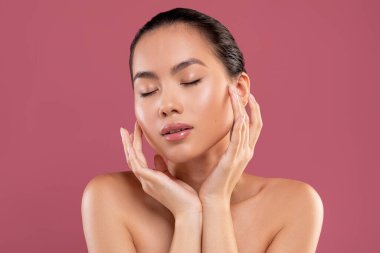 Sensual korean lady enjoying her beauty routine