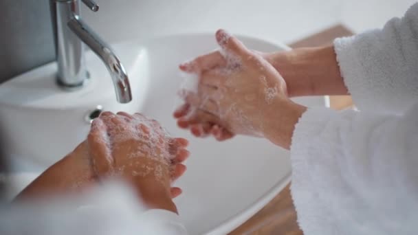 Couple Washing Hands With Antibacterial Soap In Bathroom, Cropped — Vídeos de Stock