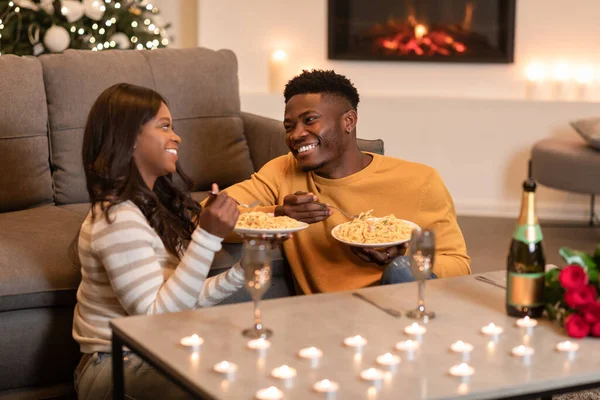 Black Spouses Celebrating Christmas Holiday Having Romantic Dinner At Home