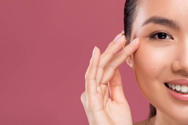Half face of korean lady enjoying her beauty routine