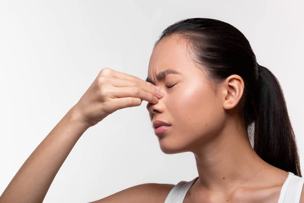 Upset korean lady massaging nose bridge, closeup photo — 스톡 사진