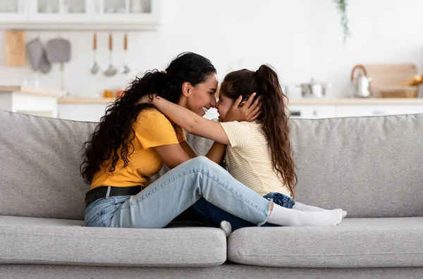 Mothers Love. Happy Young Mom And Little Daughter Embracing At Home —  Fotos de Stock